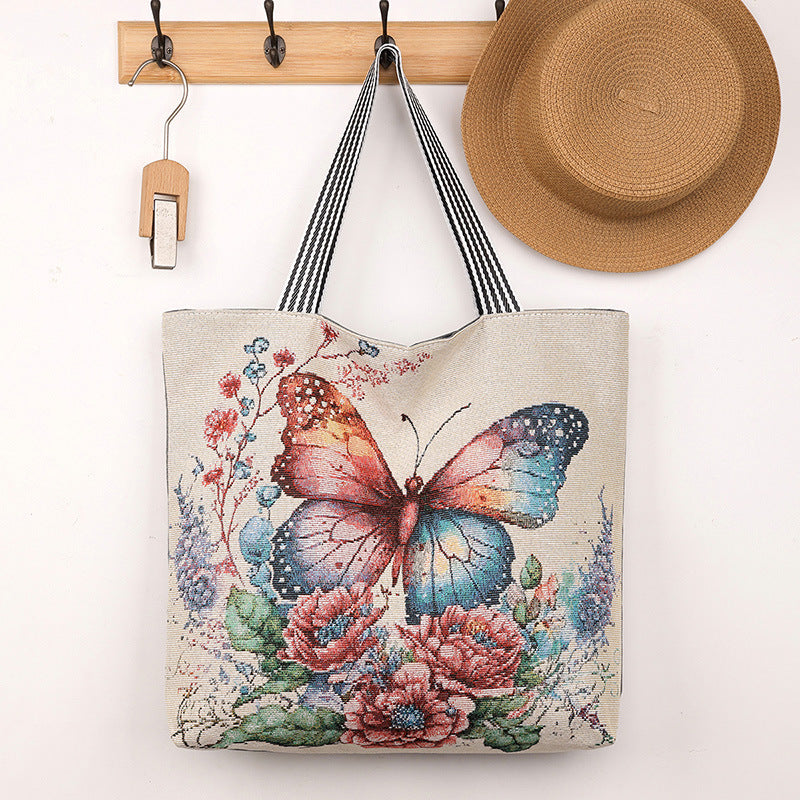 QIUDU Chinese embroidered tote bag women carrying lifestyle shot