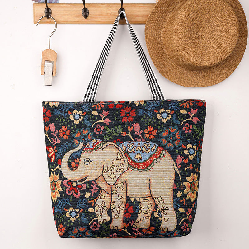 QIUDU Chinese embroidered tote bag front view with cartoon design