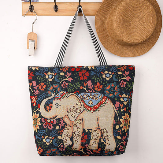 QIUDU Chinese embroidered tote bag front view with cartoon design