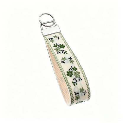 QIUDU embroidered keychain women holding lifestyle shot